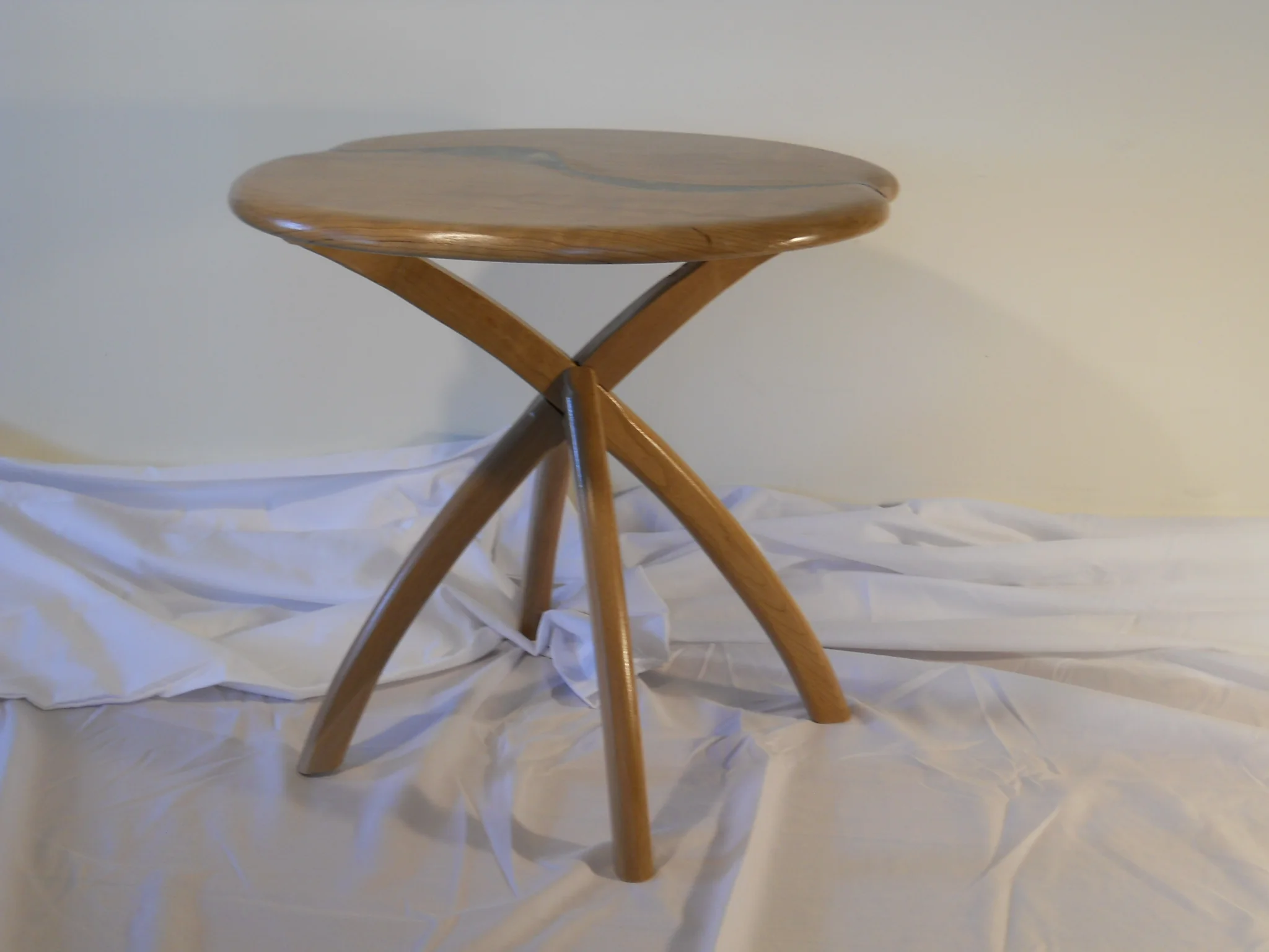 "Next to chair table", approx. 17" roundish, 17" high