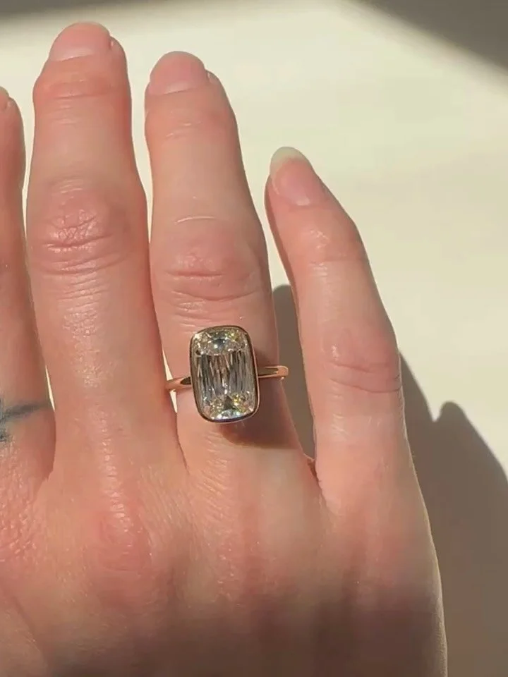 Wow! Stunner crisscut solitaire for Anika &mdash; we focused on finding the perfect unique diamond and appropriate size for her hand. Set in 18k and extra secure in a bezel. Love a minimalist setting with an interesting diamond cut 😍😍