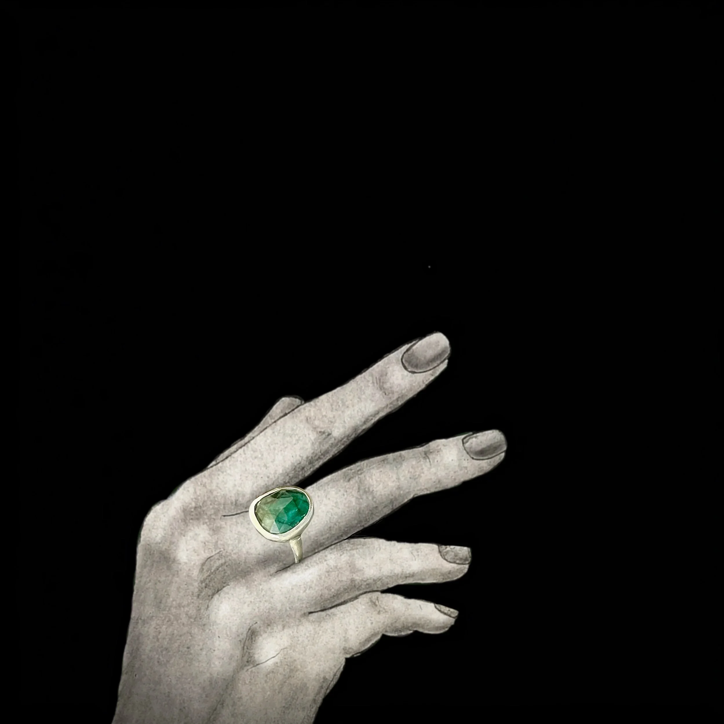 emerald+ring+black+background+hands+copy.jpg