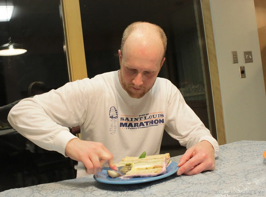 Rare image of tyrannical manspreader enforcing the patriarchy onto a defenseless sandwich.