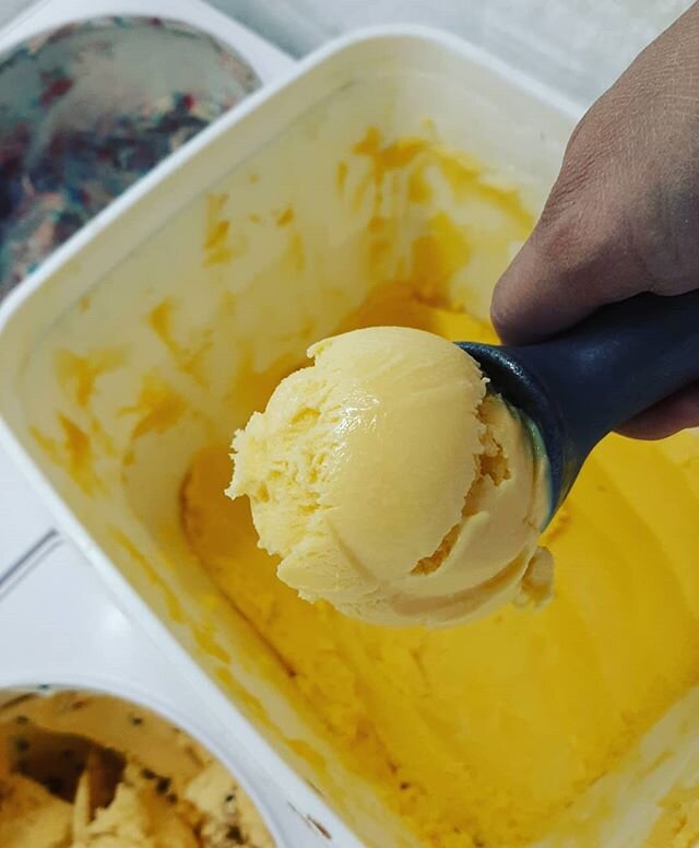 Scooping mango ice cream....while it lasts! #slickables #mangoicecream