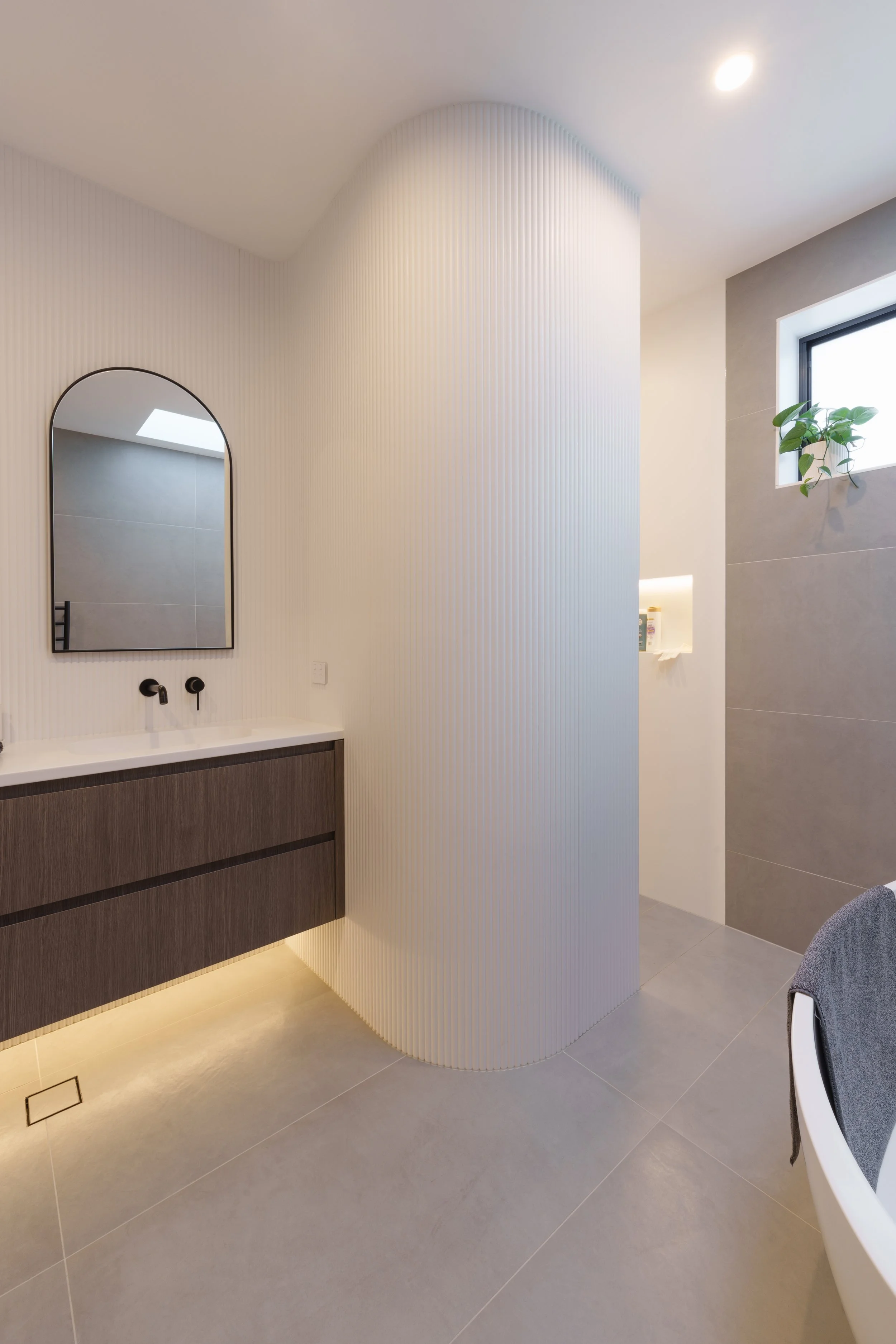 Fluted Corian Bathroom Wall