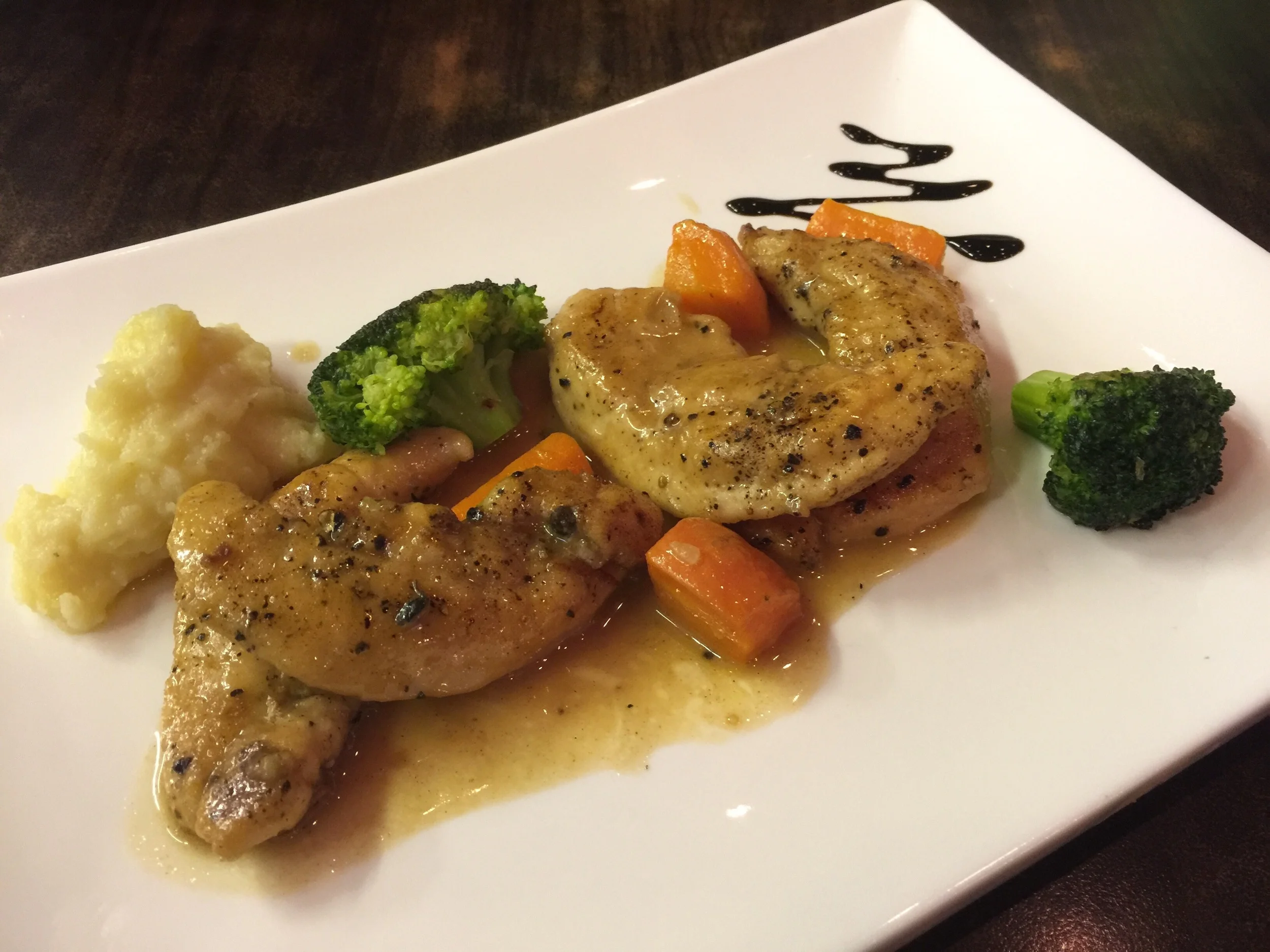 Pollo - Strips of chicken covered in brown sauce