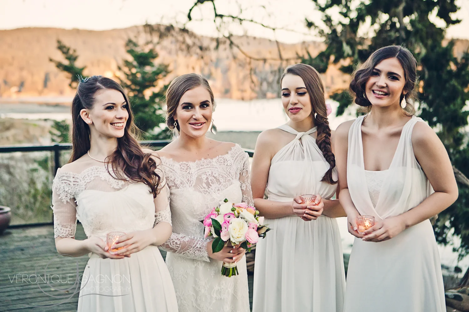 Bride and bridesmaids in all in cream with pastel accents