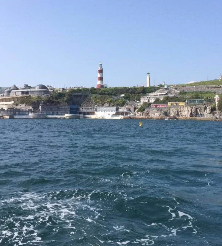 A view of the Hoe and Foreshore while conducting practical work on one of the many boats the university has.