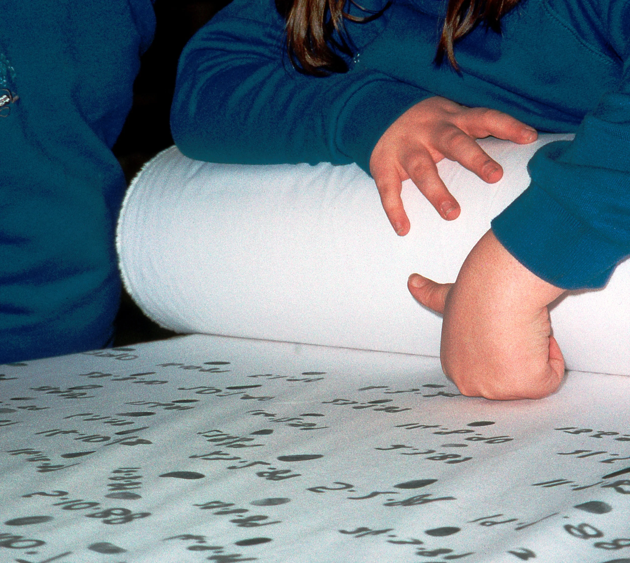 23 Children printing their thumbs.jpg