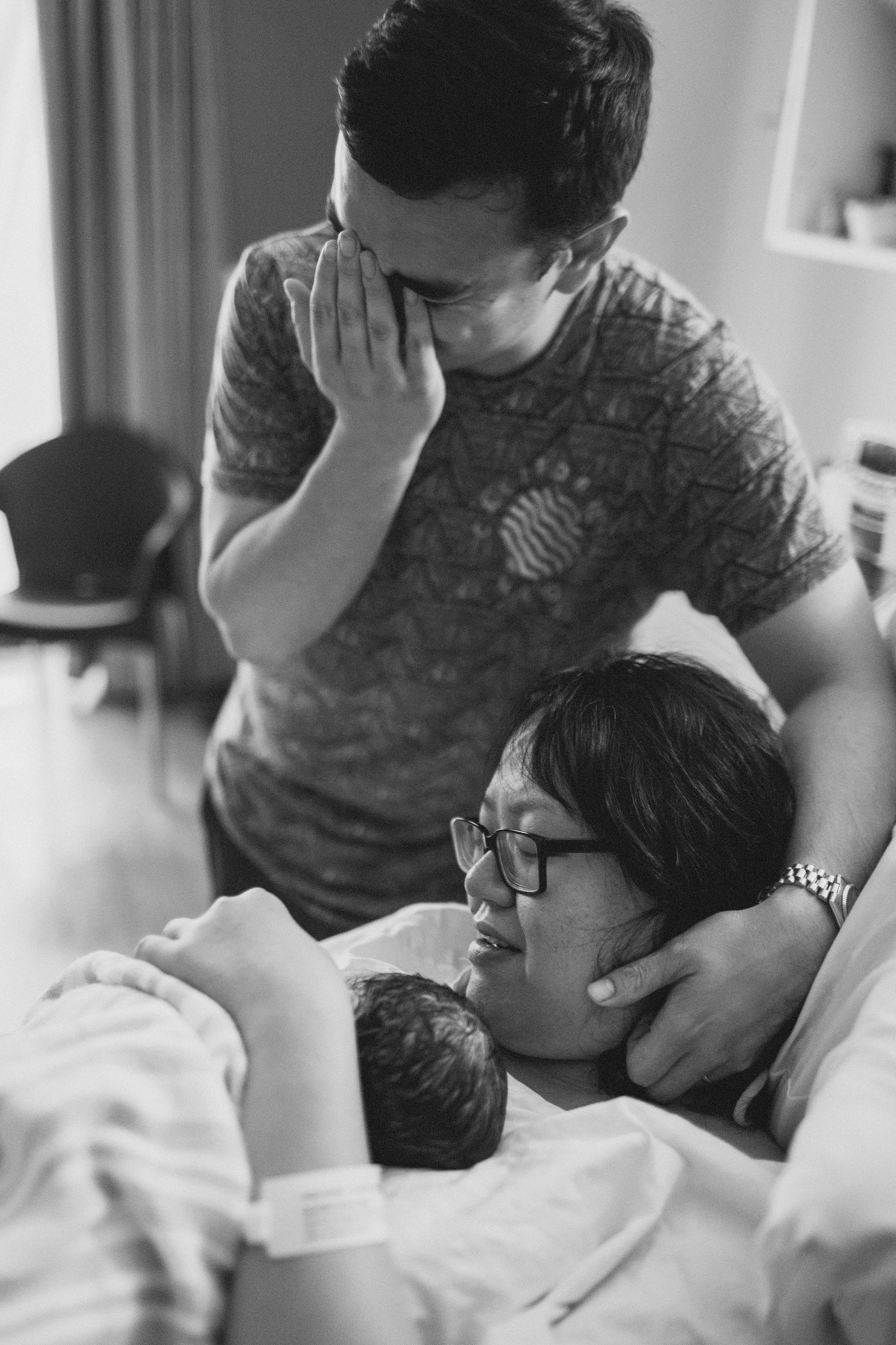 A tearful first hello for this first time daddy.