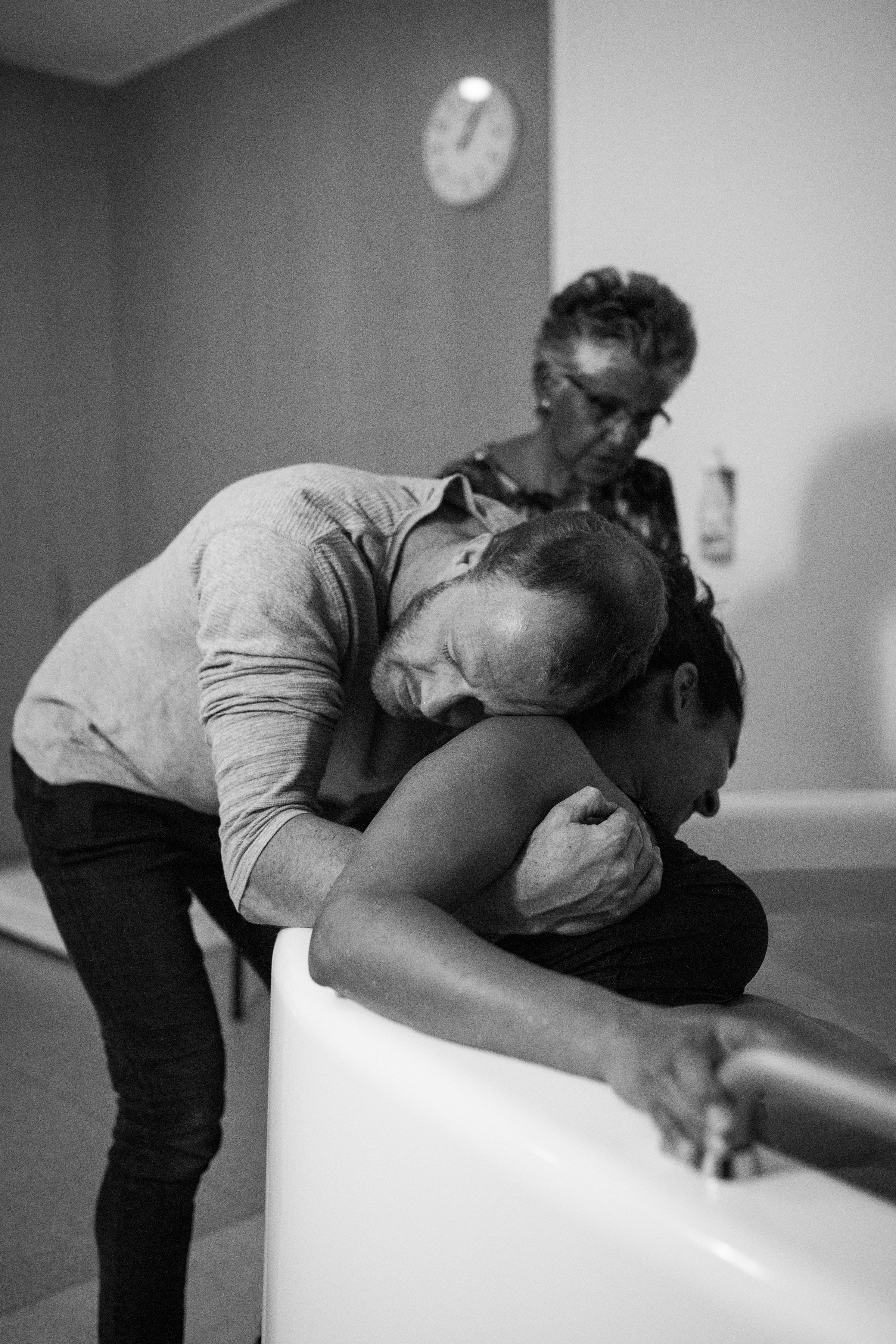 We love capturing the connection between mother and father as they labour. Pure love!