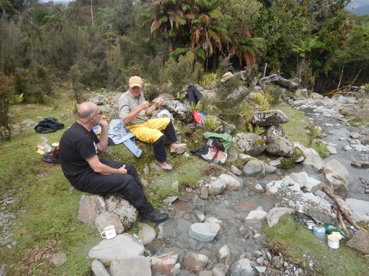 Awarua Guides offer authentic wilderness adventure, here our guests John & Pete enjoy a perfect lunch break.