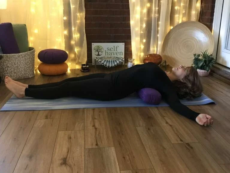 Reclined Supported Back Bend.jpeg