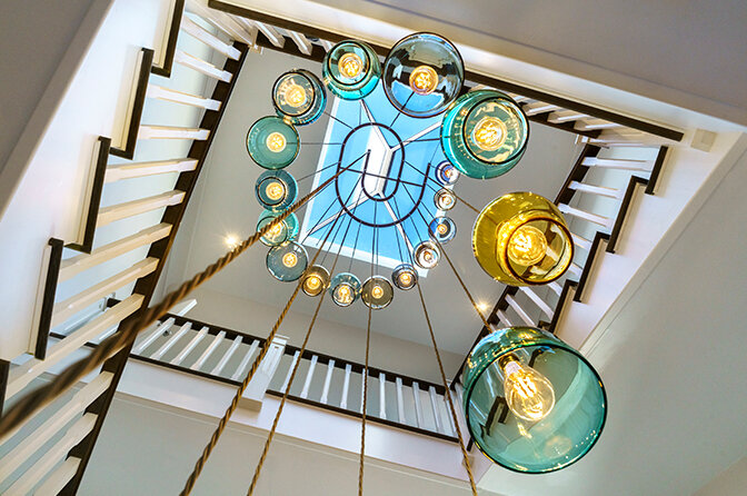 Stairwell Chandeliers take lighting design execution to a new realm as the pieces need to work in so many more perspectives. Addressing the complexities of the space in which a chandelier is to hang is one of the challenges Esther enjoys best.
