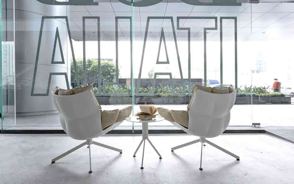 2/4 Husk indoor/outdoor armchairs by Patricia Urquiola.