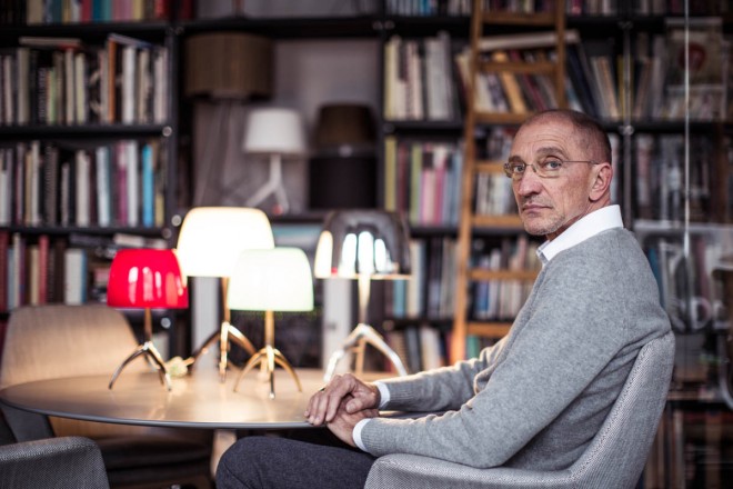 Designer Rodolfo Dordoni with his Lumiere lamps for Foscarini.
