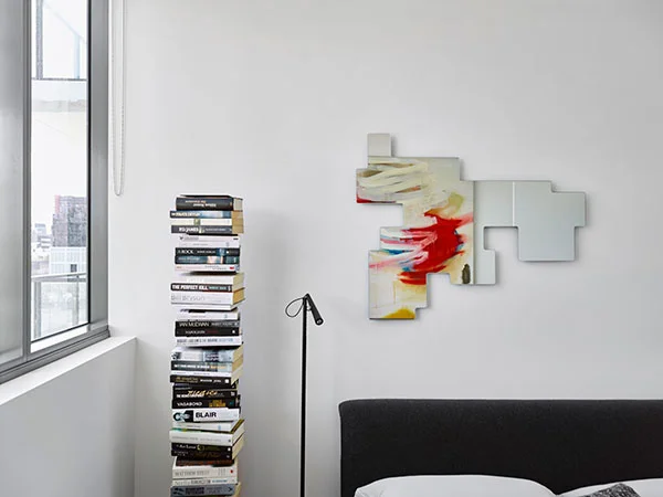 Opinion Ciatti Ptolomeo bookcase , Glas Italia Space Invaders mirror, Foscarini Magneto floor lamp and B&B Italia Siena bed .
