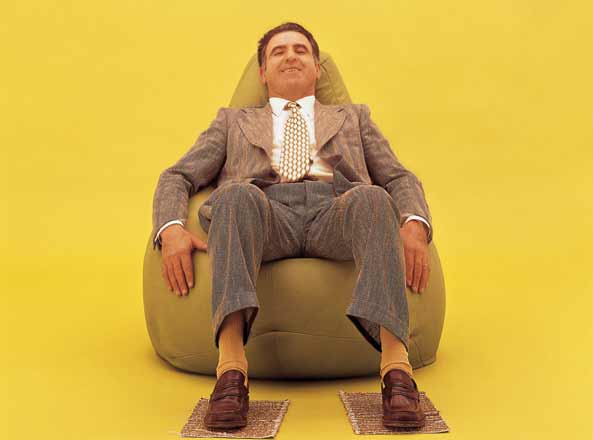 Zanotta's founder Aurelio Zanotta in the Sacco bean bag. Photo: Zanotta