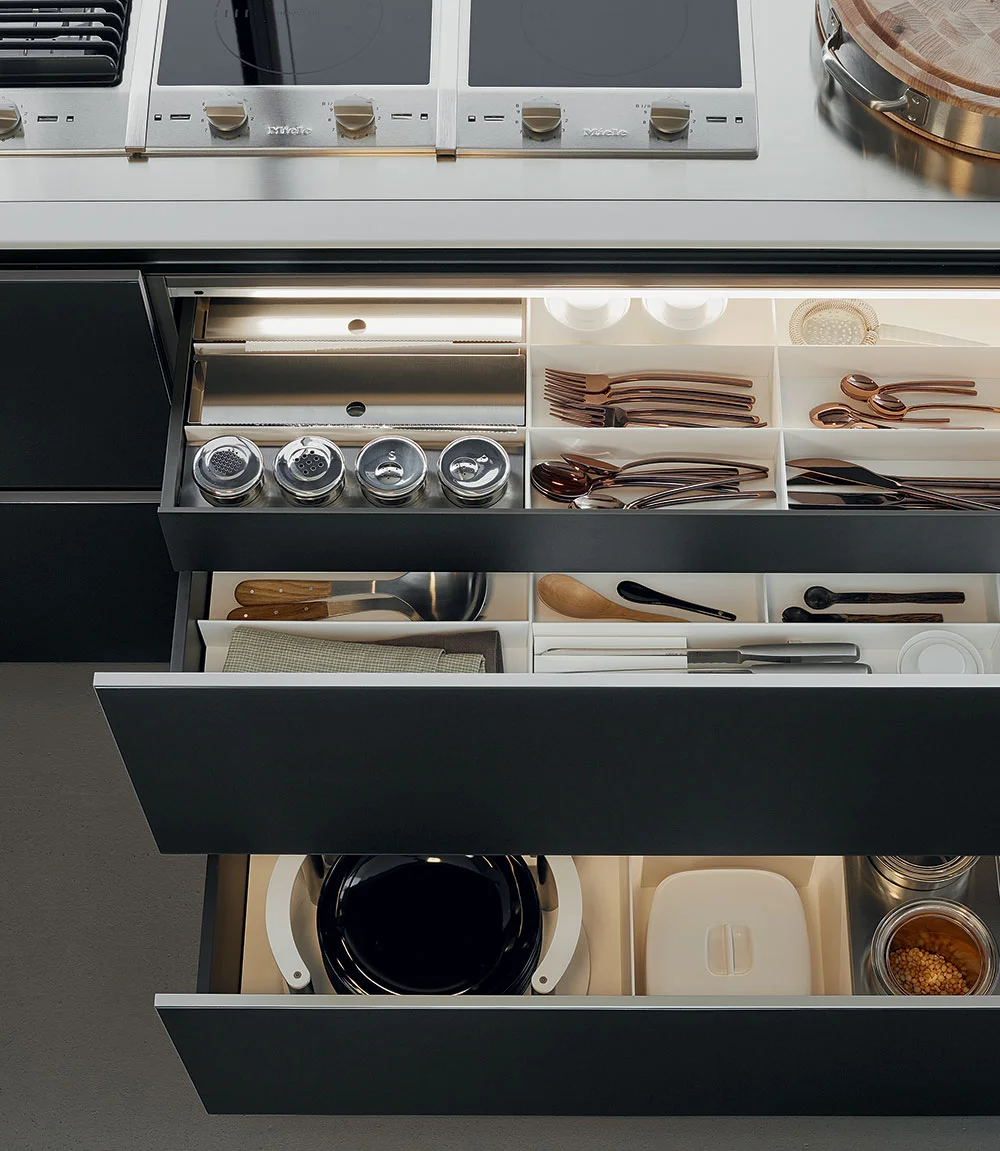The Twelve kitchen system by Carlo Colombo features a 12mm slim profile and push and pull servo drive opening mechanism.