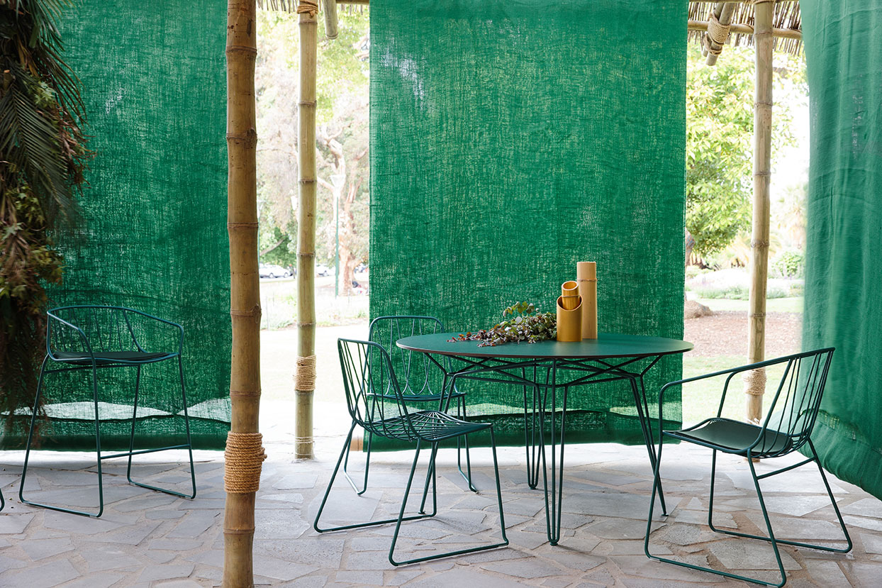 The SP01 Design Chee Chair collection and Parisi table in green.