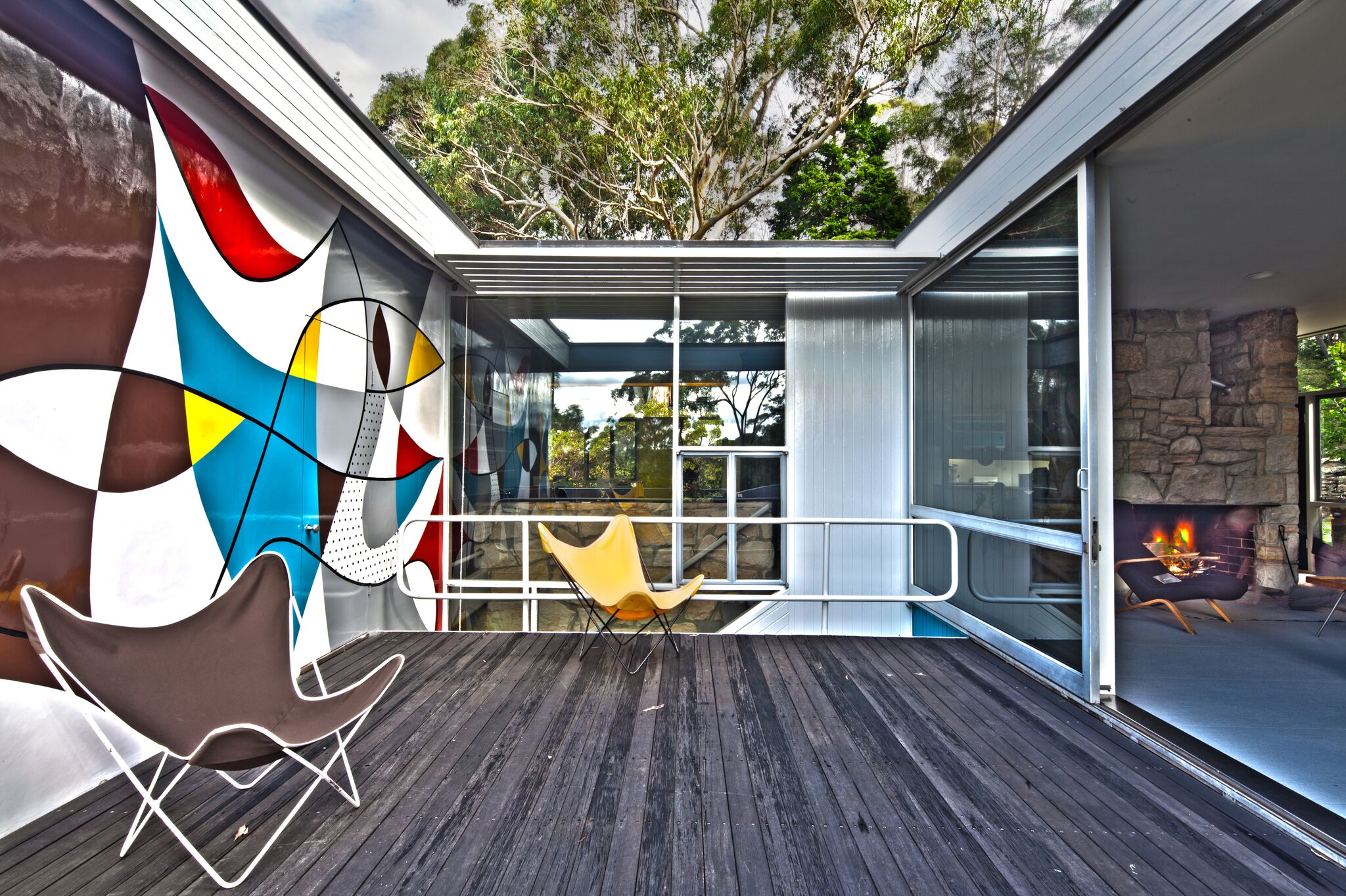 The verandah provides light and airflow to the house and includes an eye-catching mural designed and painted by Harry Seidler. Photograph copyright Phyllis Wong for Sydney Living Museums. 