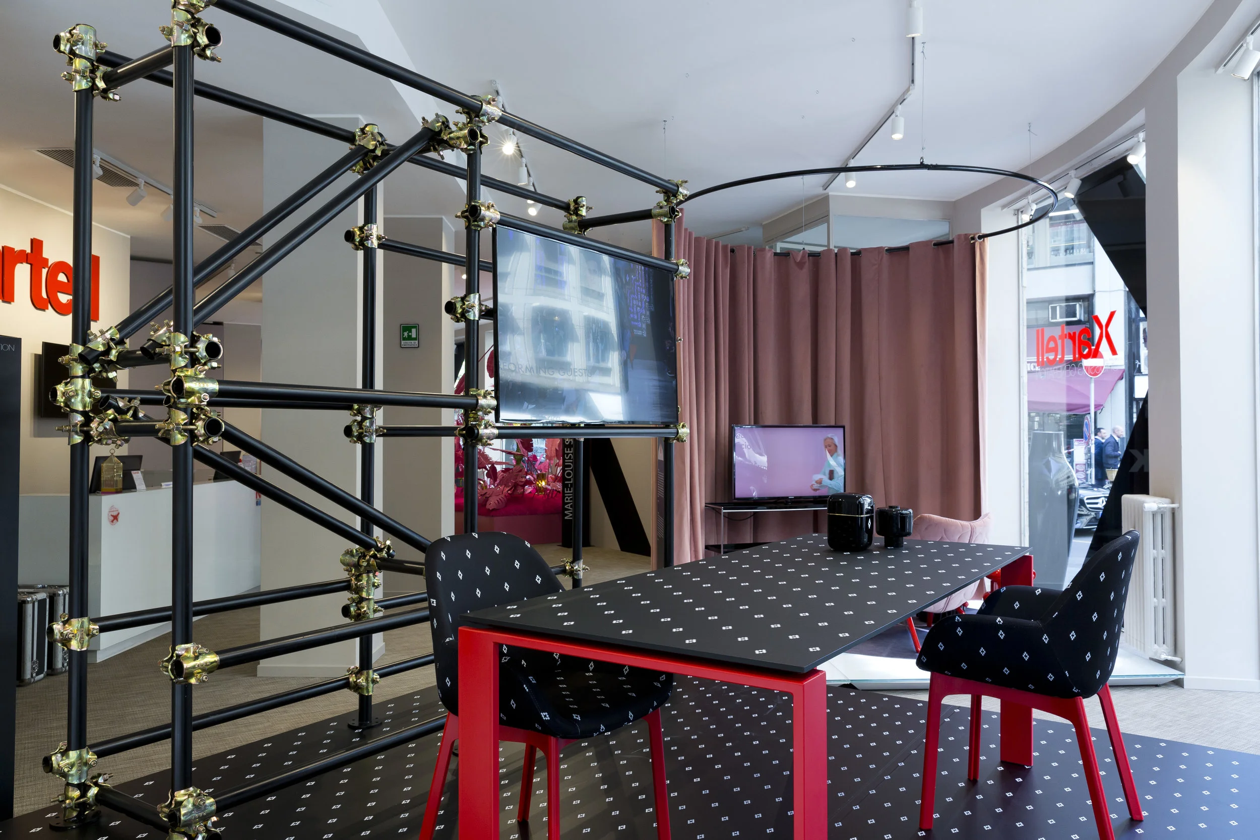 The 'Kartell Crossing Generation' exhibition at their Flagship store on Via Turata.