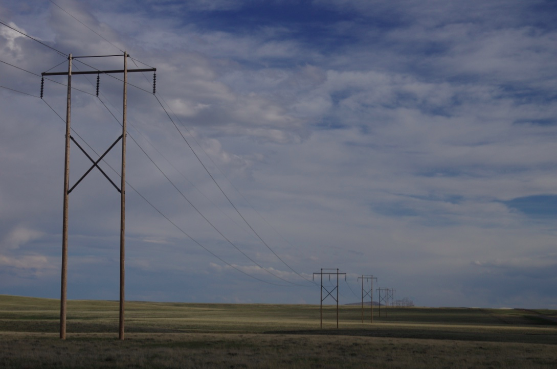 Power transmission lines march across the Shirley Basin in central Wyoming. Stephanie Joyce.