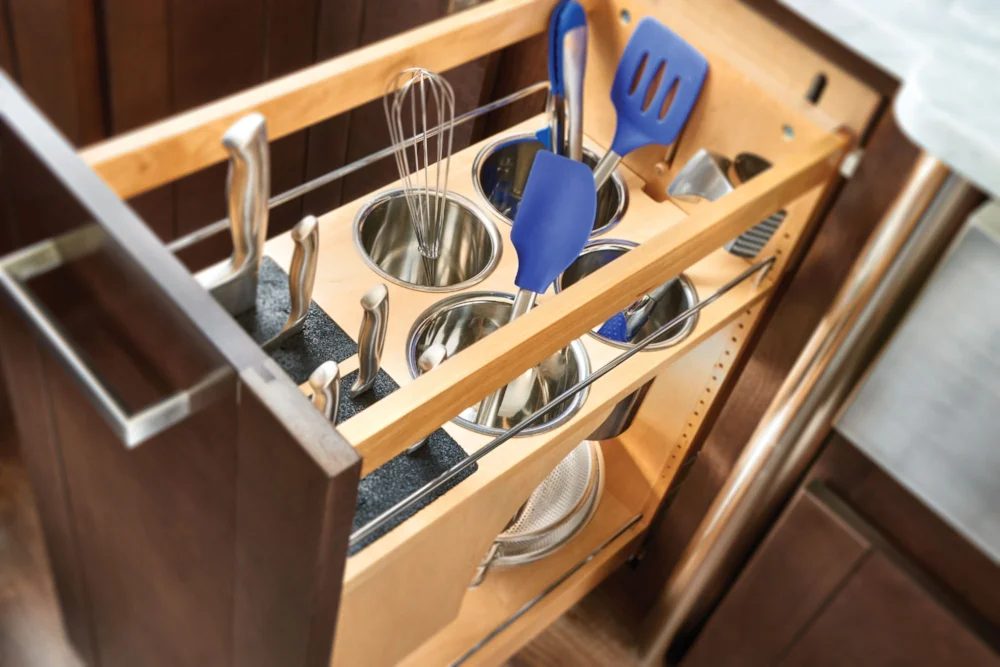 This one base cabinet pullout organizes knifes, utensils, bowls and even small appliances.