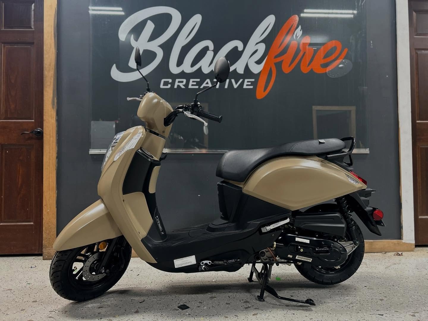🏍️🔥 Check out this cool transformation from white and boring to cool and custom! We wrapped this moped in KPMF Satin Desert Sand, giving it a unique, rugged look that&rsquo;s tough and stylish. 

#BlackFireCreative #MopedWrap #SatinDesertSand #Cust