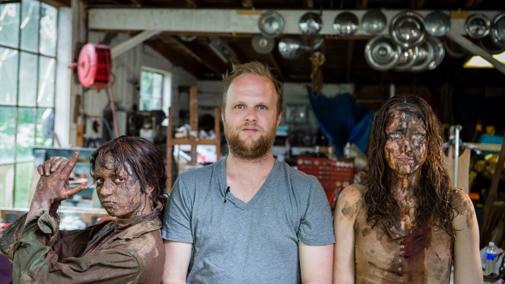 Director/Producer Rod Blackhurst poses with “Here Alone” stars Gina Piersanti (left) and Lucy Walters (right) during filming.