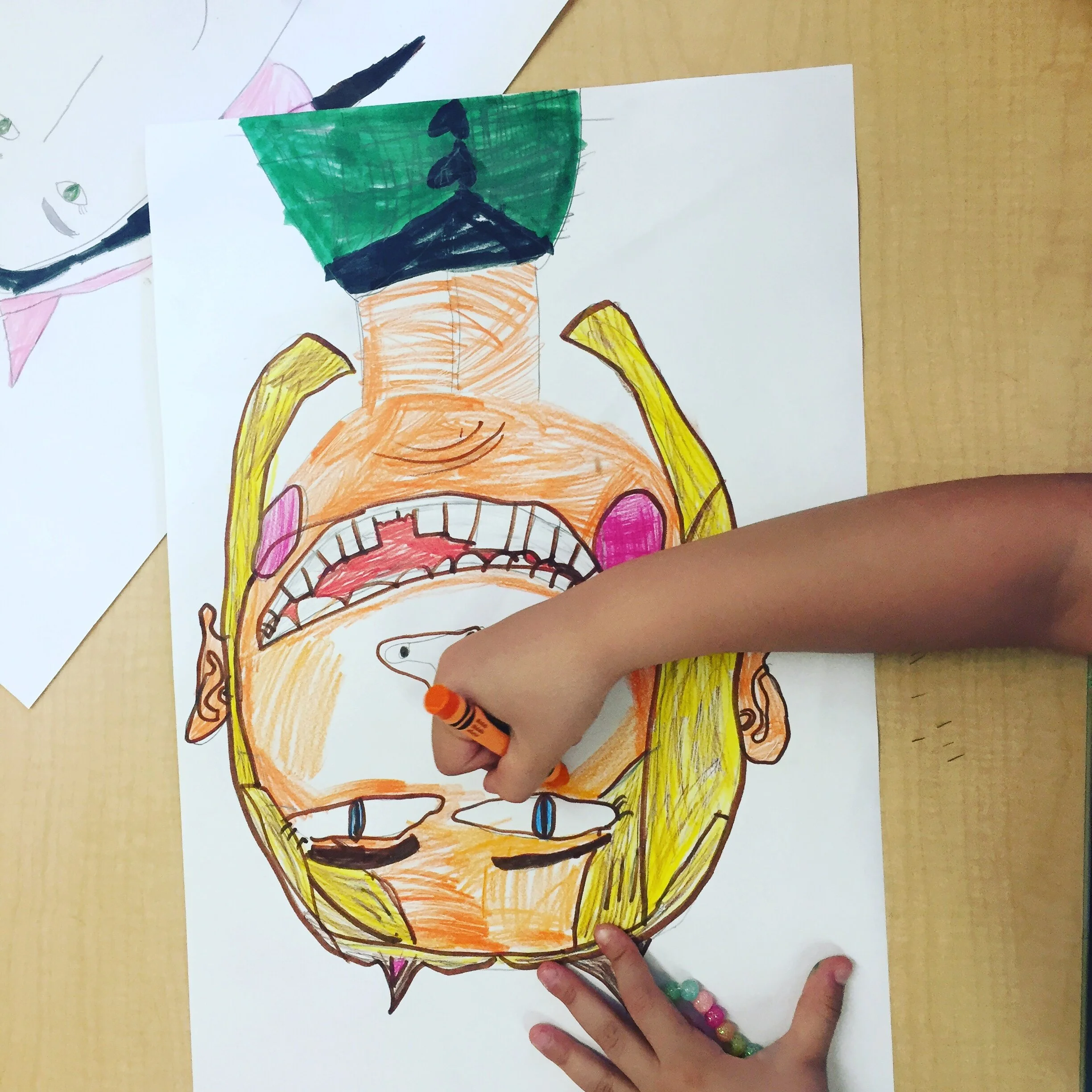 Kids self portrait in progress.jpg