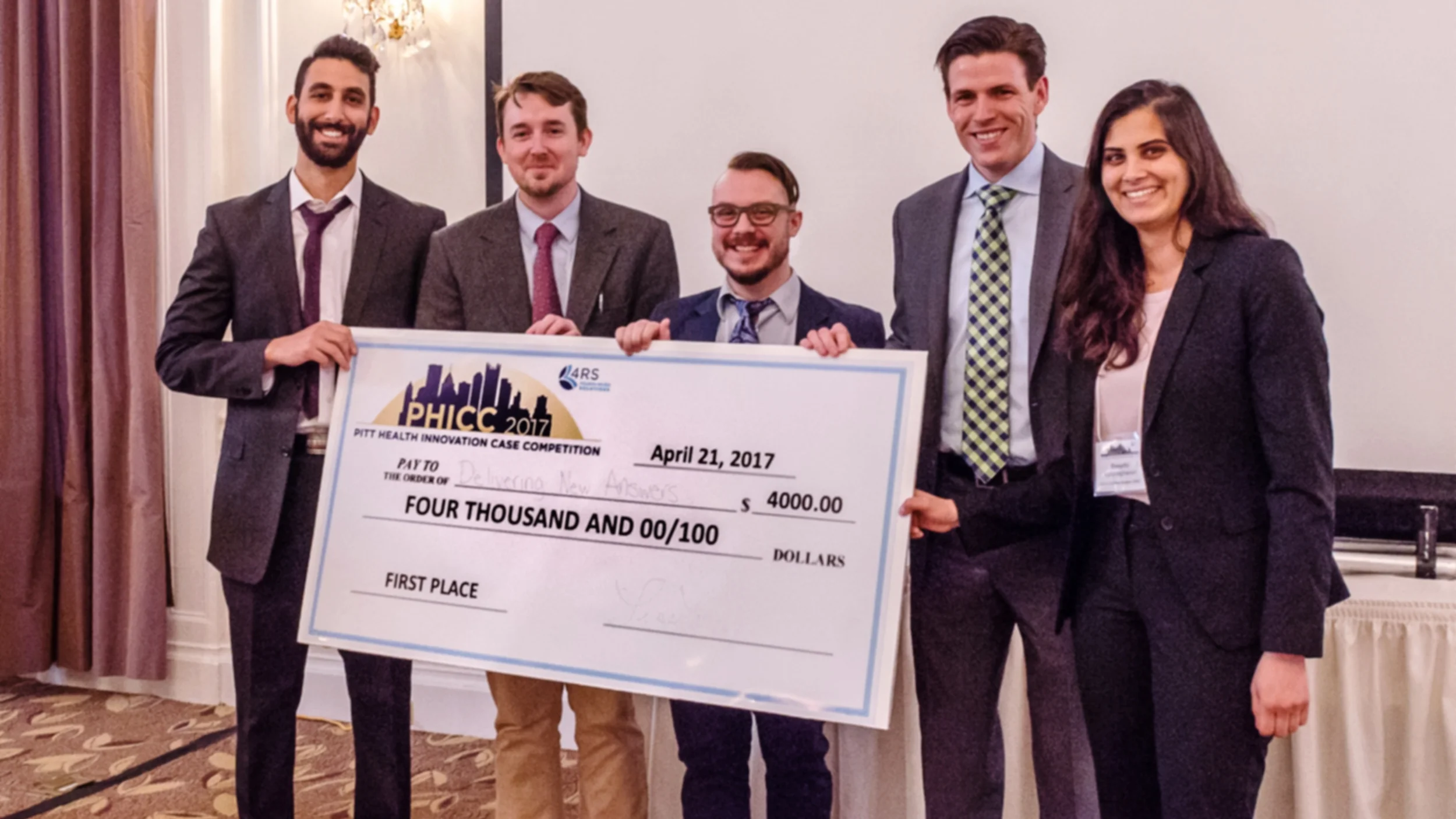 Team Delivering New Answers relishes their first place win in this year's competition. Congratulations!