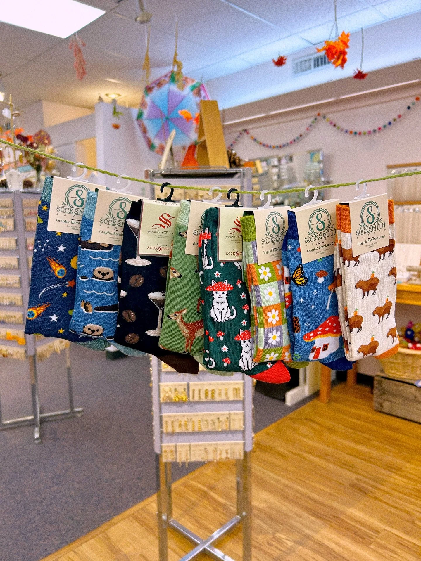 Fresh restock of @socksmith socks!! Come grab yourself a pair 🧦 🍄🦦☄️🌼🦌 We&rsquo;re open 11:30-7!