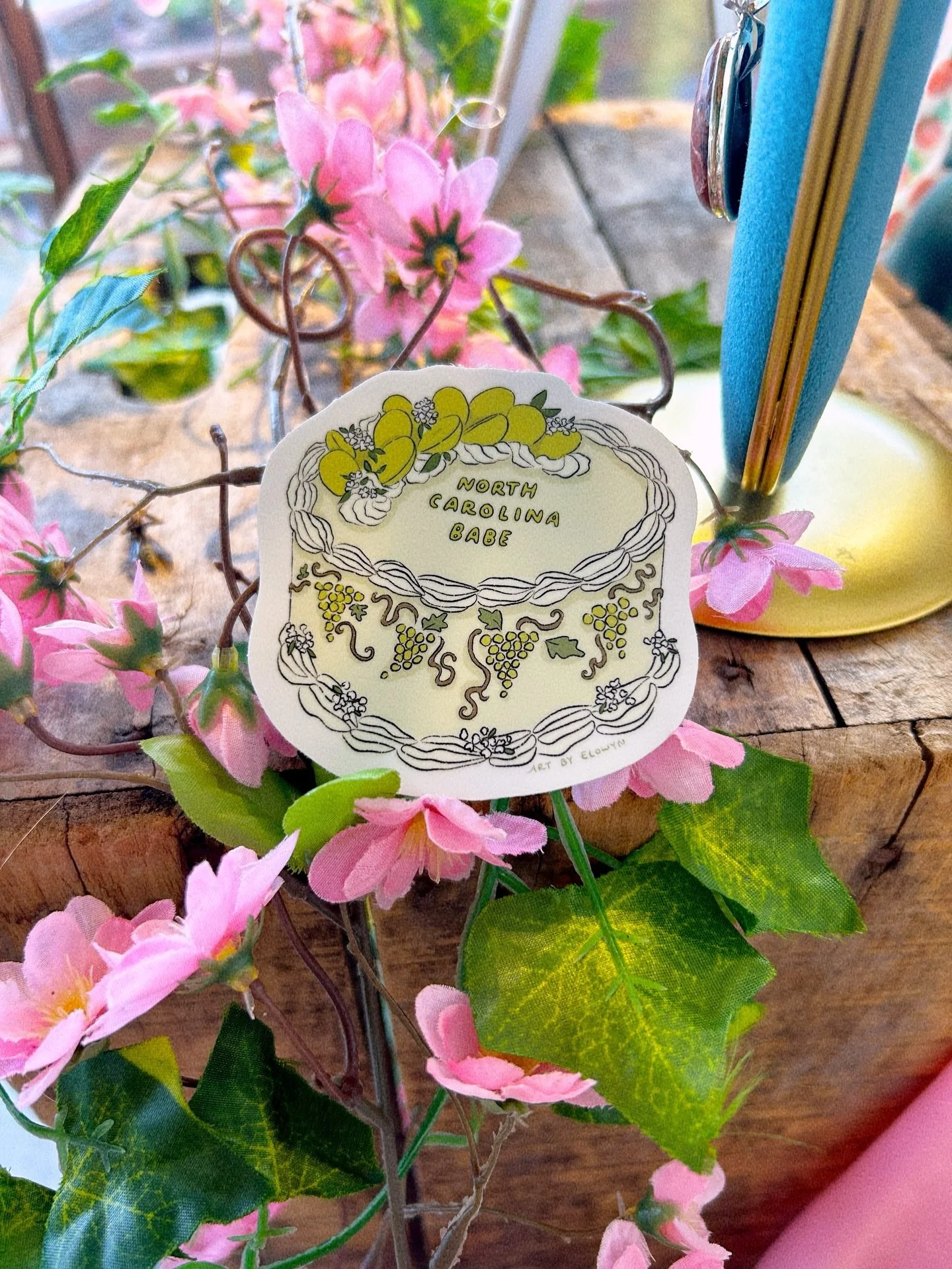 North Carolina Babe sticker by @elowyn.makes.art <3 Tag your favorite North Carolina babe in the comments, and we may pick you and your bestie to receive one of these stickers! 🌿