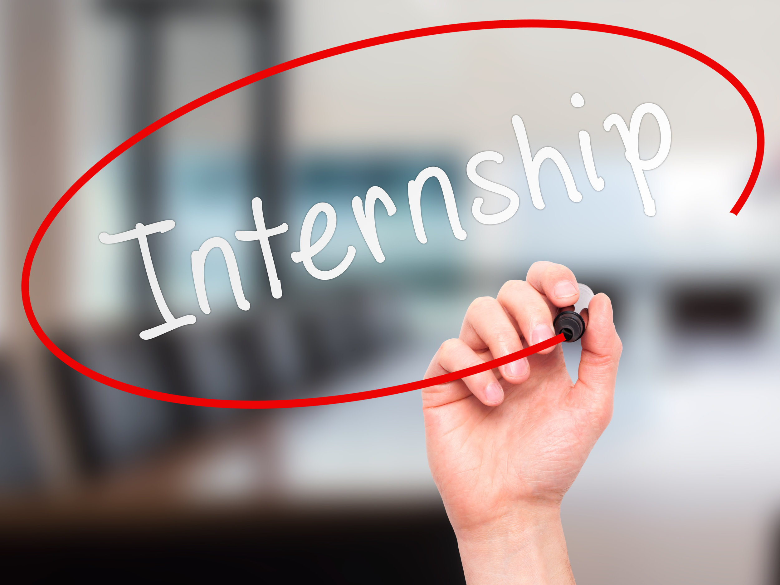 Man hand writing Internship with marker on visual screen.