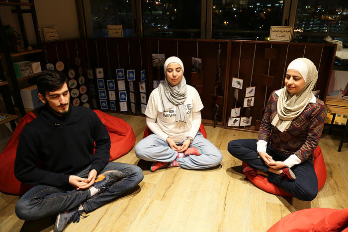 Meditator, Fares Akasheh and mediation trainers, Nesreen Khashman and Aseel Nassar (L to R).