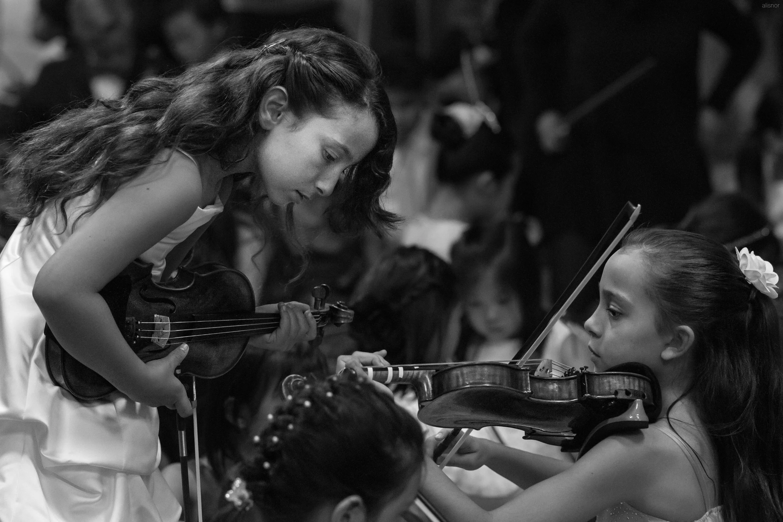 Girls tuning violin Palos Verdes LR.jpg