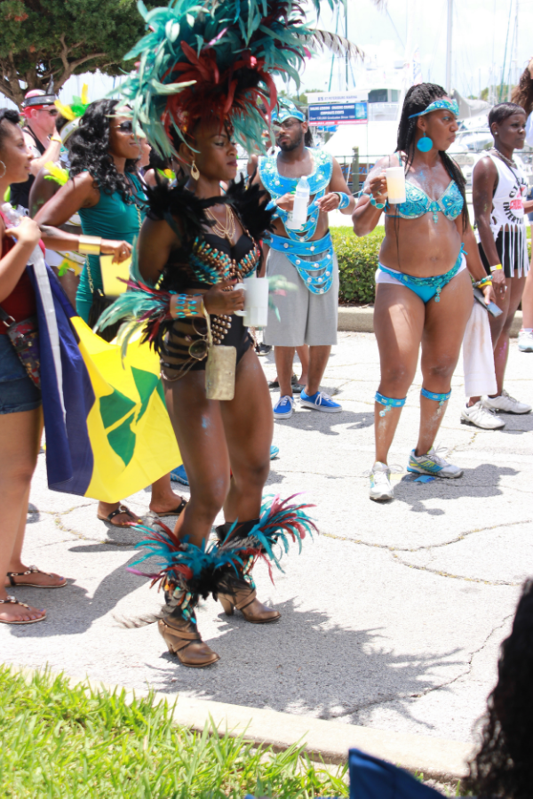 Ashlee John, a physical fitness instructor known as Fete Fit, attends Carnival each year. "It's rich in culture, music, and vibe, there's unity, " she says referring to the Tampa Bay Carnival on Sunday June 7, 2015 in St. Petersburg, FL.