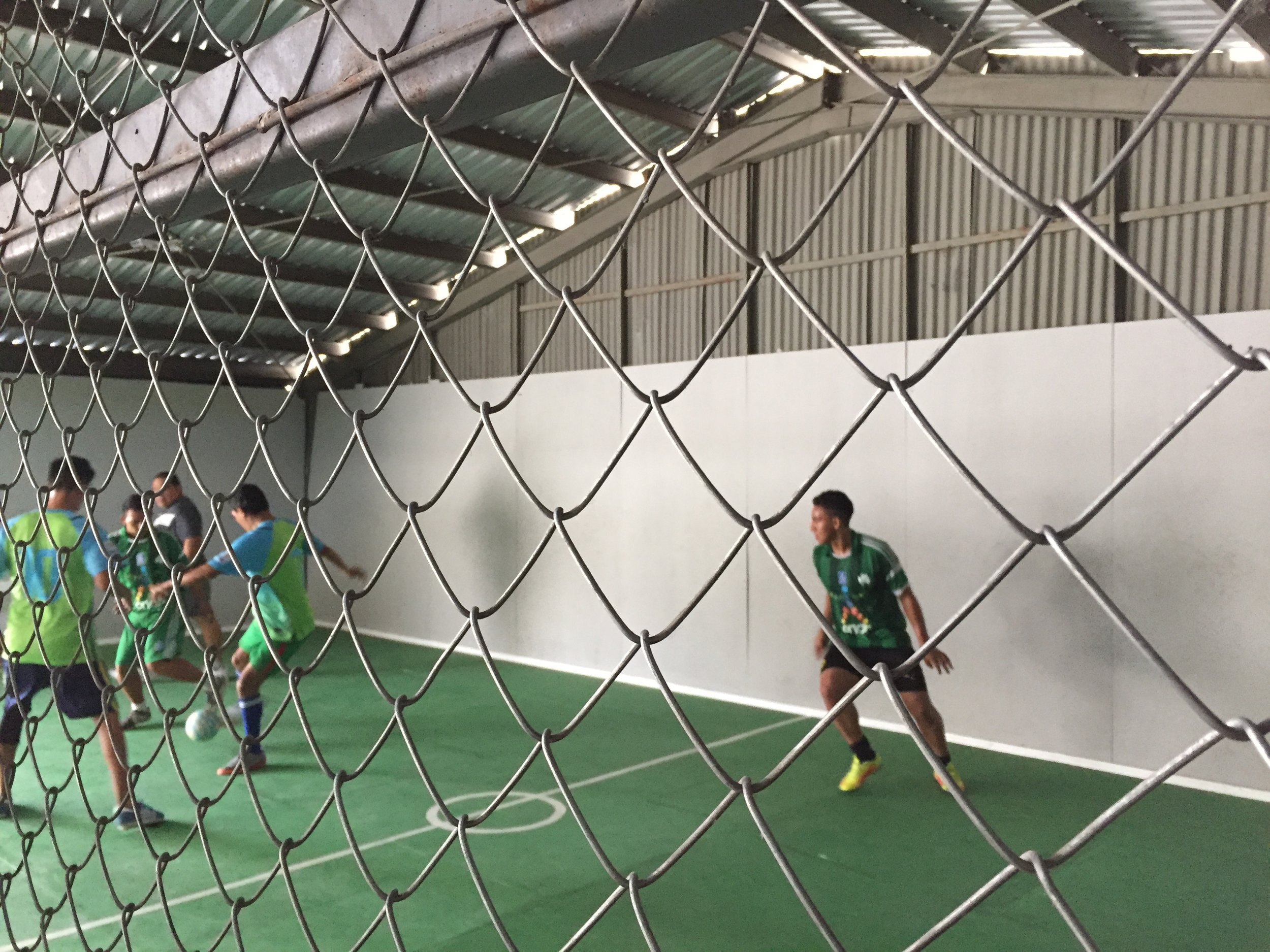 Two teams playing in the soccer tournament on Monday morning