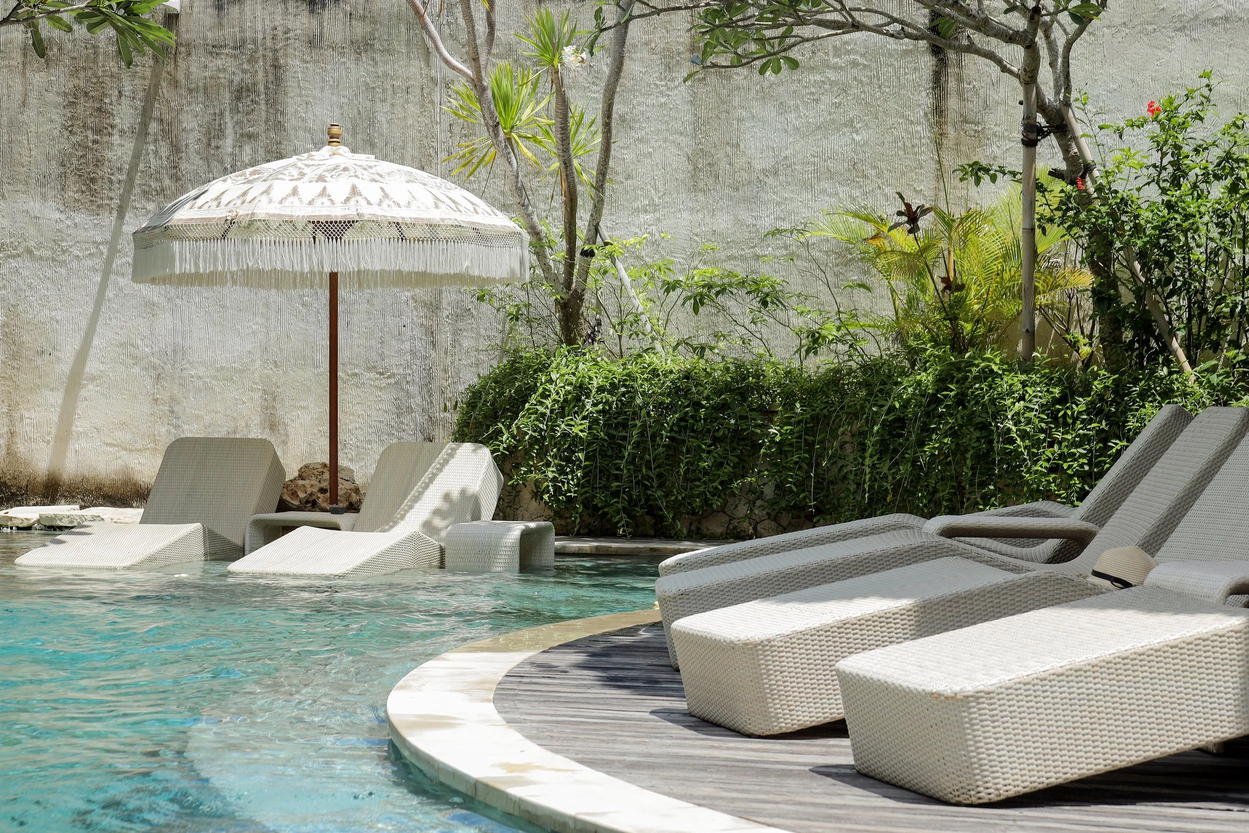 cozy-pool-with-relaxing-rattan-chair-2023-11-27-04-53-45-utc.jpg