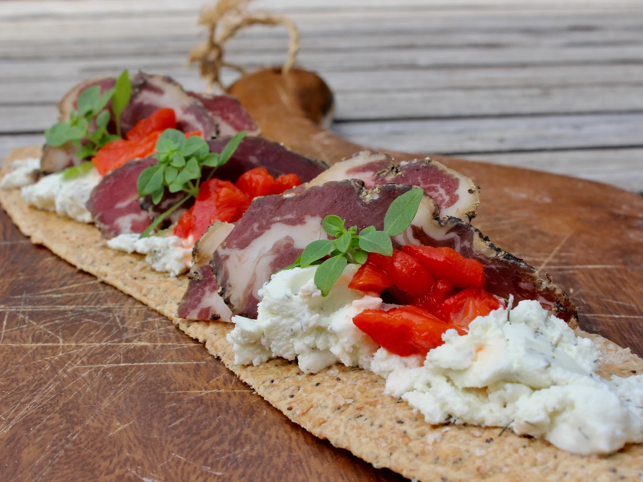 lavash, goats' cheese, cured meat