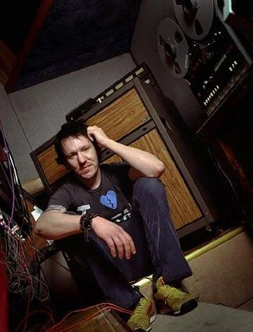 Elliott Smith sitting by the Sony MCI JH-24 2" tape machine at NMS.