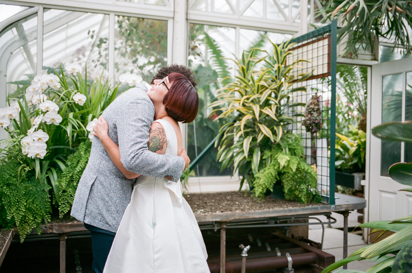The first look from a Volunteer Park Conservatory elopement in Seattle, Washington.