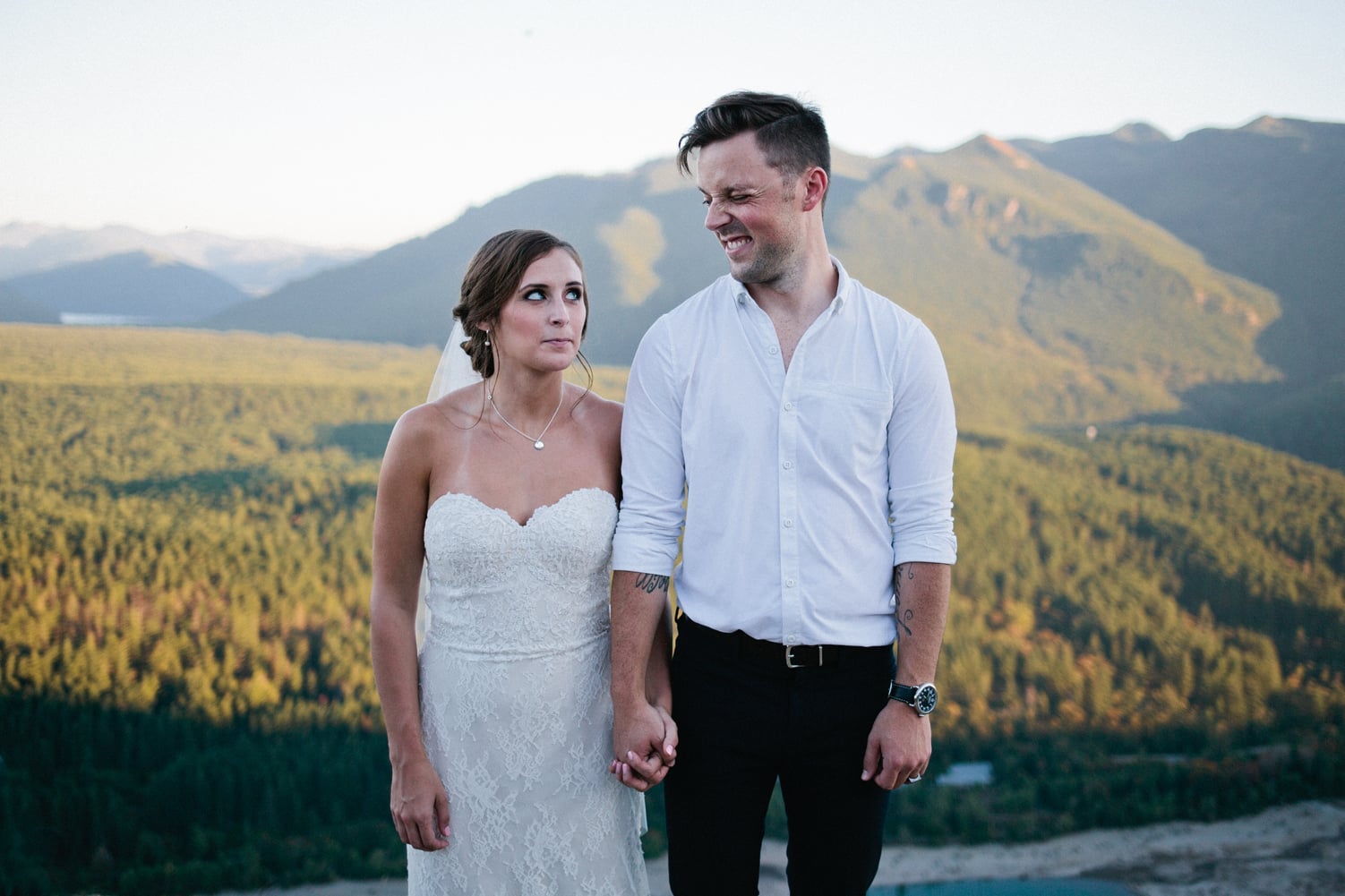 Bride and groom at Rattlesnake Ledge by Alexandra Knight Photography.