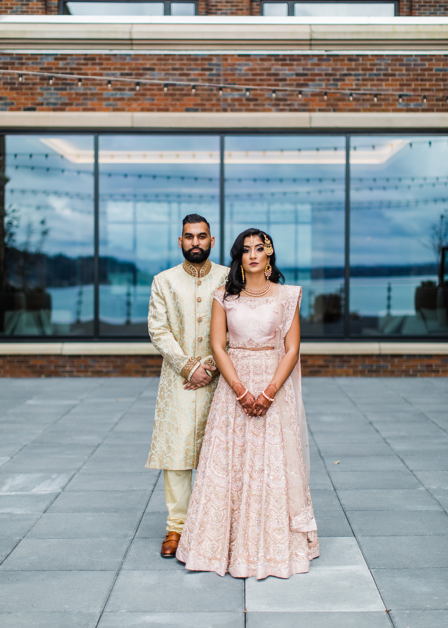 Alexandra Knight Photography Seattle Indian Wedding Photographer bride and groom in blush and gold wedding garments lehenga.jpg