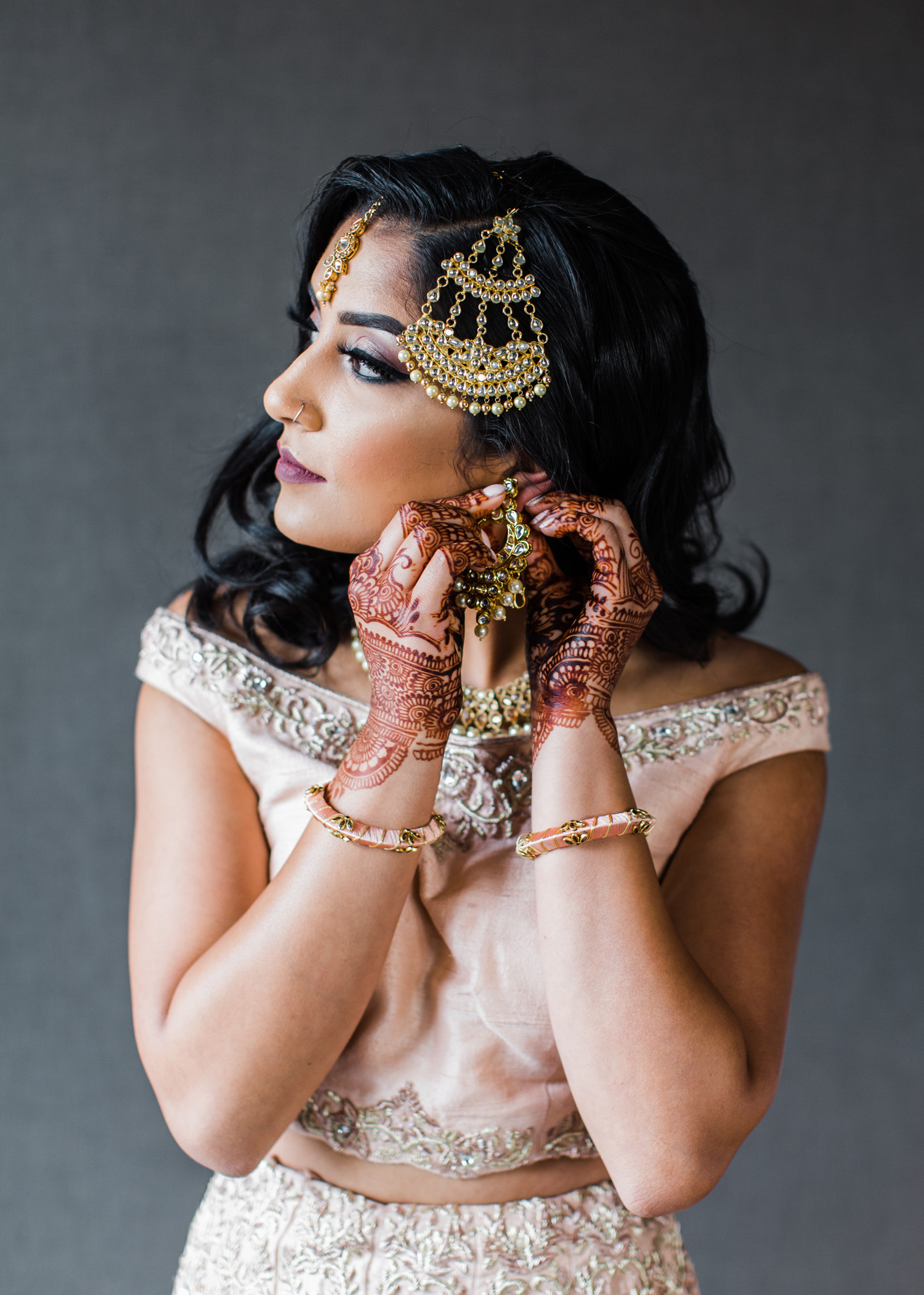 Alexandra Knight Photography Seattle Indian Wedding Photographer Bride with henna and blush wedding lehenga.jpg