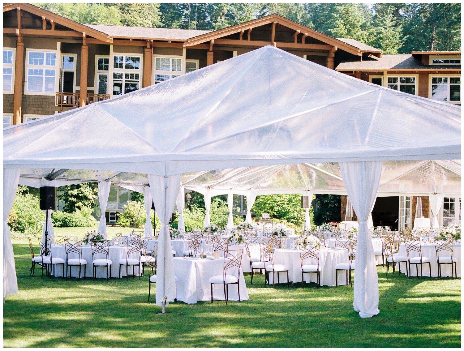 Alderbrook Resort outdoor wedding reception under a clear tent