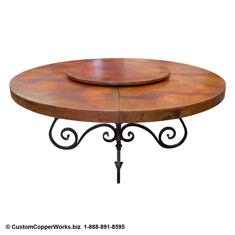 Round copper top extension table; scrolled, Tucsan, Spanish Colonial style forged iron table base.