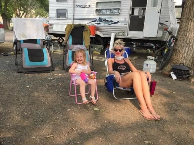 My youngest granddaughter "Harlow Rain" sitting with grandma. 