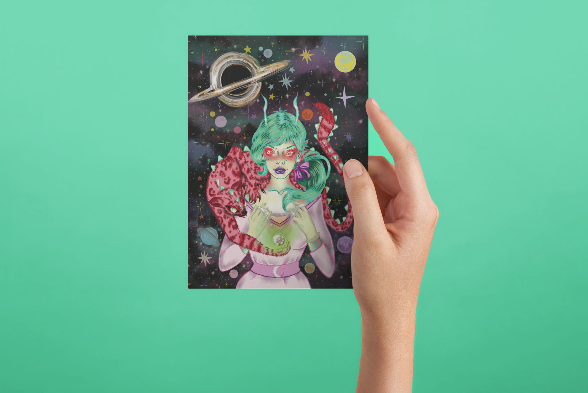 postcard-mockup-being-held-against-a-solid-color-surface-a20557.png