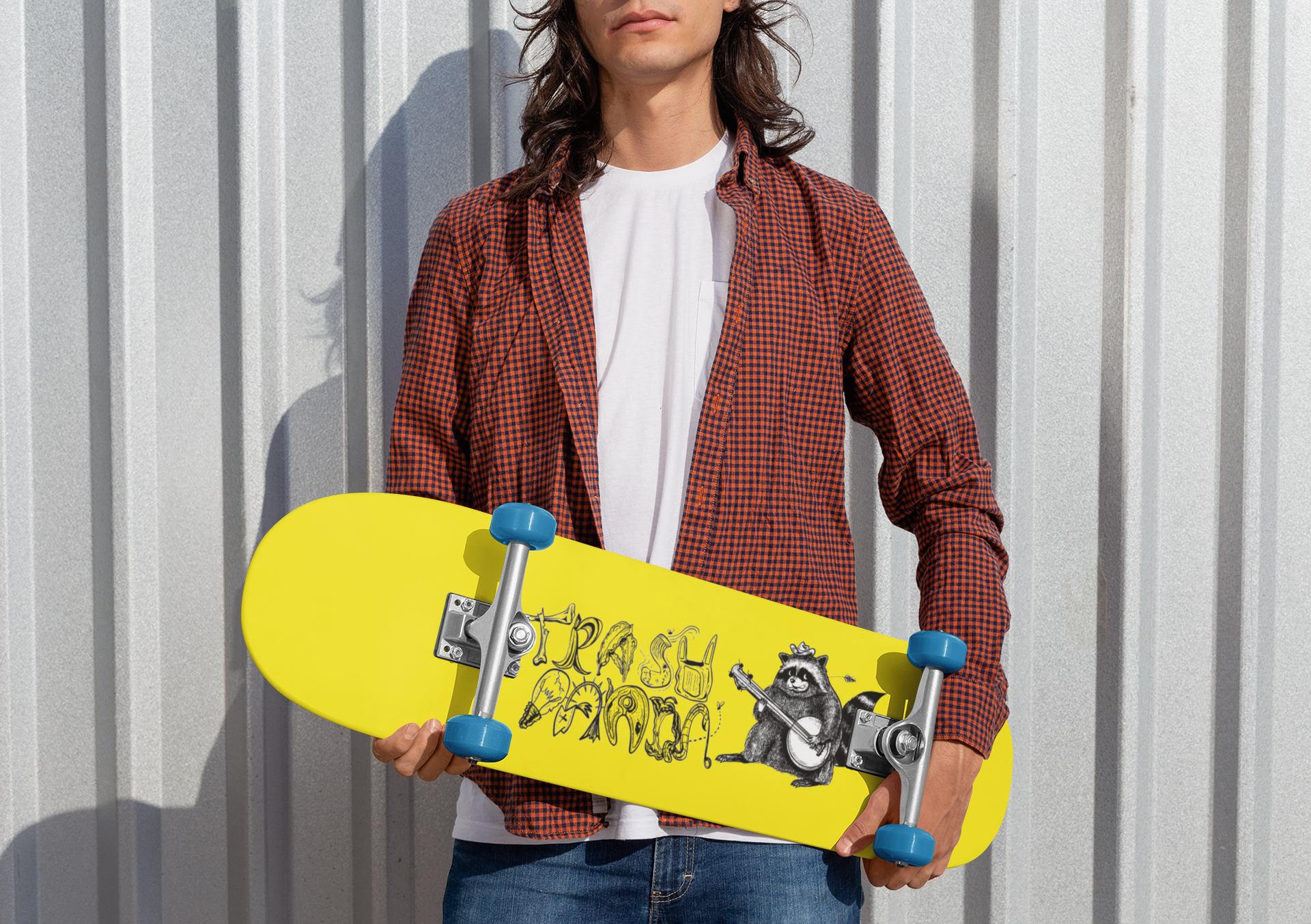 mockup-of-a-rebel-man-holding-a-skateboard-27201.png