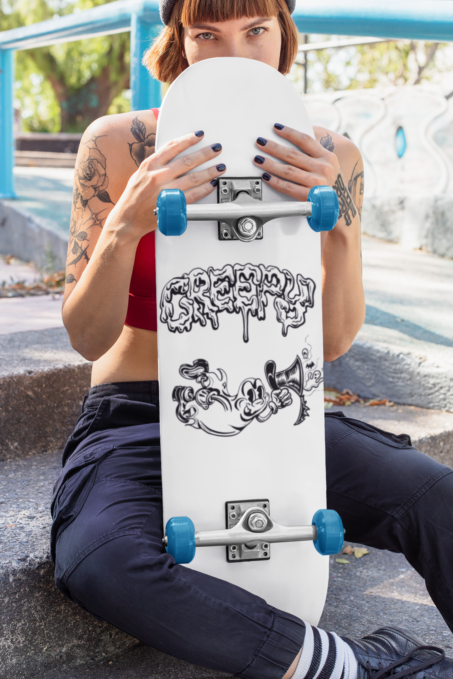 skateboard-mockup-featuring-a-tattooed-skater-woman-27112.png