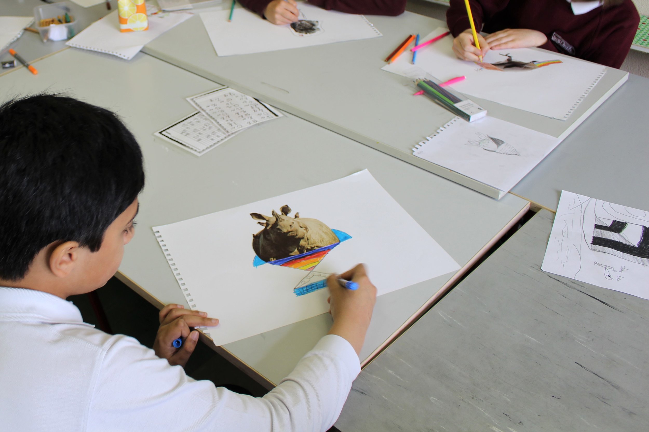  Siobhan gave each student a fragmented section of a cut out of an animal and asked each student to redesign the animal by incorporating elements from other animals and humans. 
